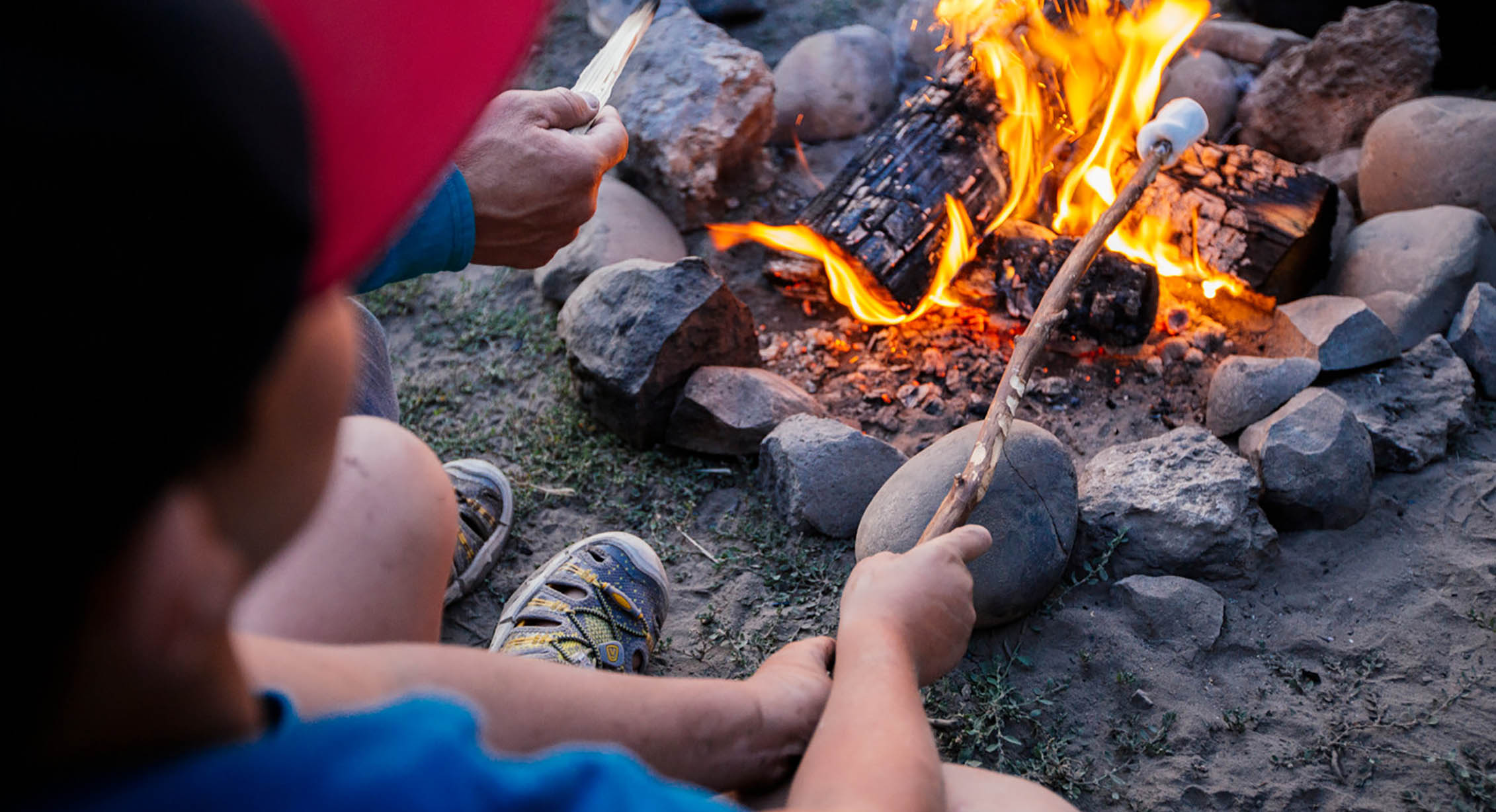 Roasting marshmallows on a campfire