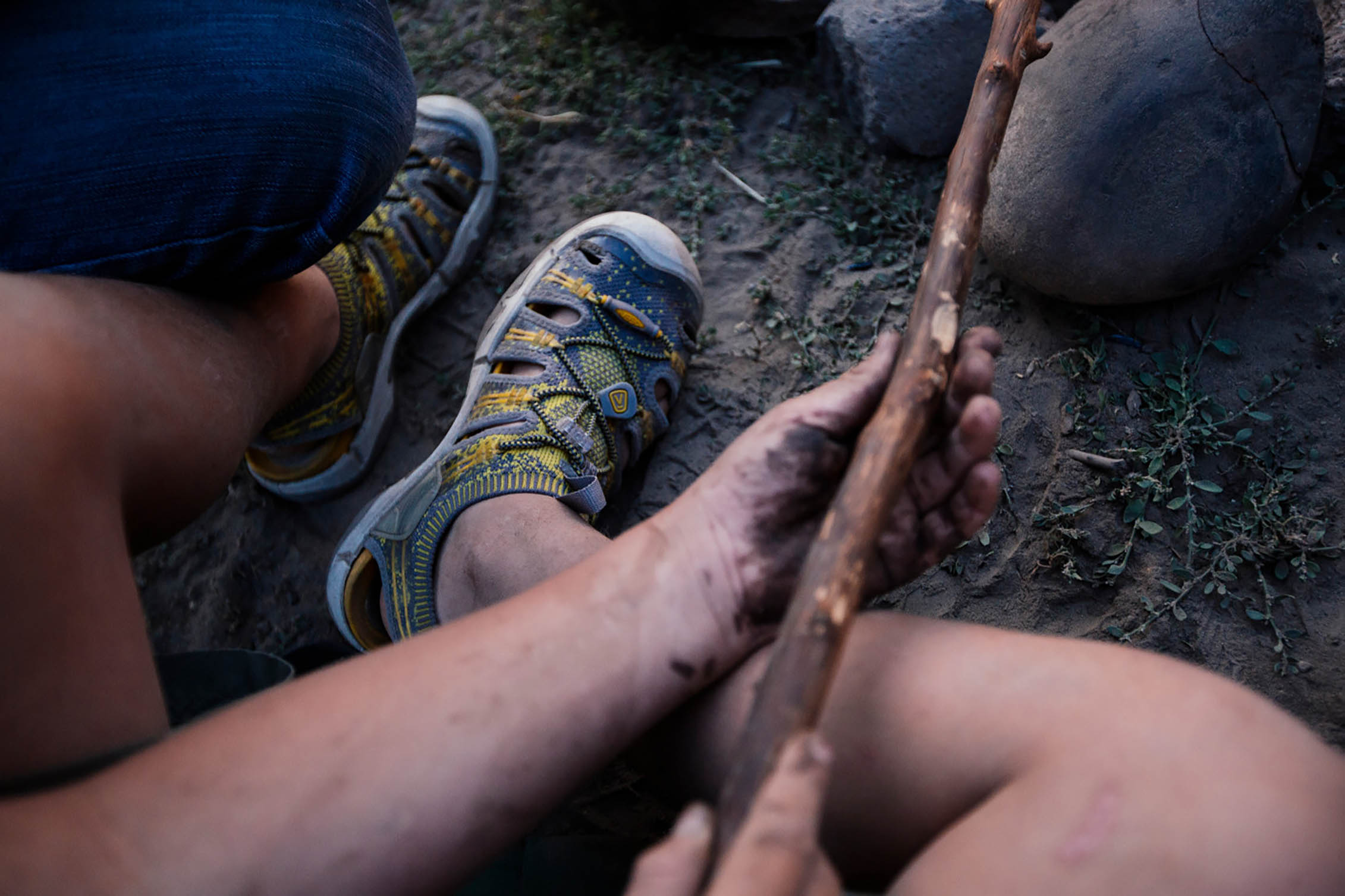 A child playing in the dirt