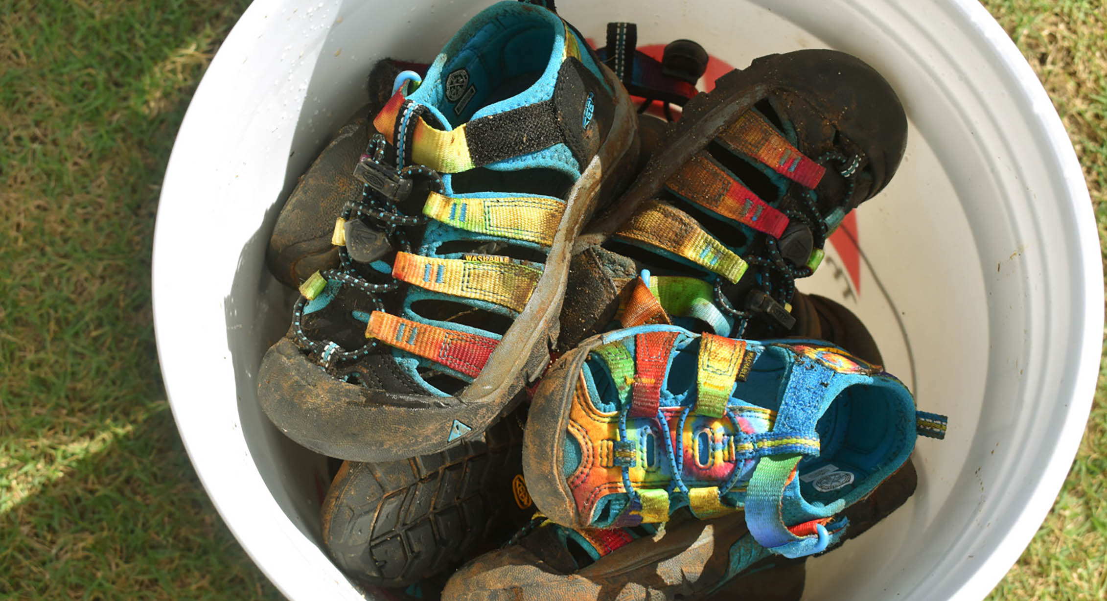 a bucket of dirty sandals