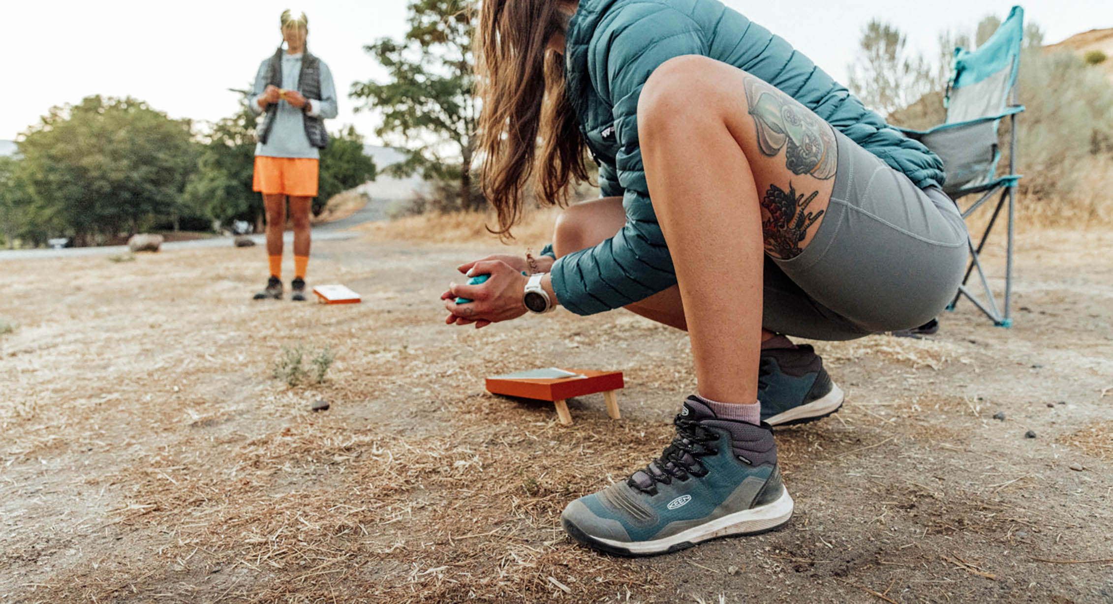 Playing cornhole while camping