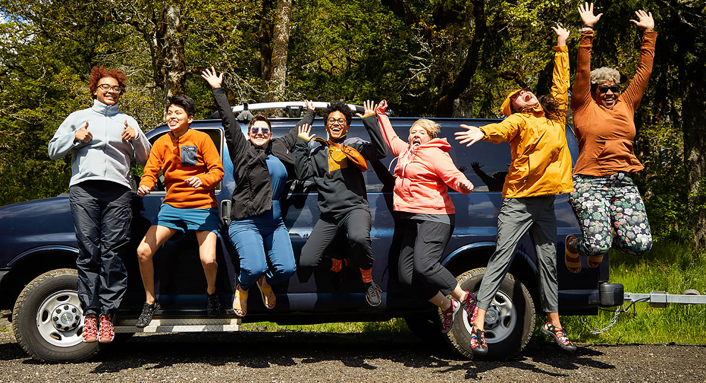 The Wild Diversity team jumping for joy