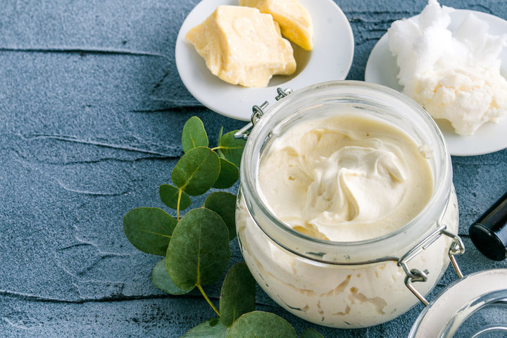 jars of ingredients for body butter recipe like shea butter.