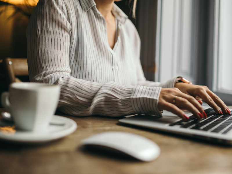 Virtual assistant working on a laptop