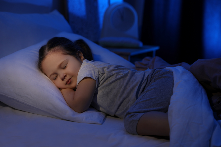 Child peacefully sleeping with a lavender-scented pillow